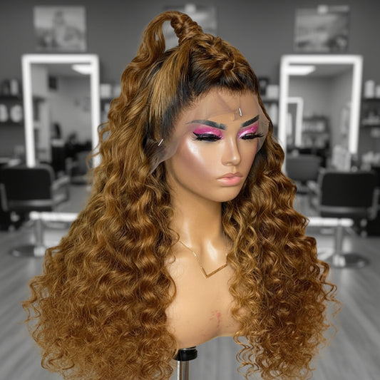 Mannequin head featuring a NuHaire Honey Blonde Ombre Deep Curly Human Hair Wig, showcasing rich honey blonde ombre, styling versatility, flowing deep curly wave texture, and skin melt thin 13x6 HD transparent lace.
