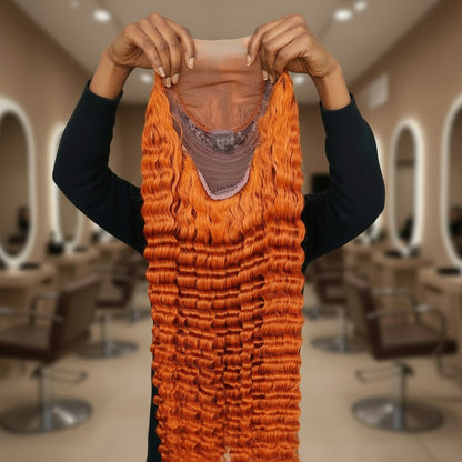 Product Display -  NuHaire #350 Ginger Deep Wave Transparent Lace Front Human Hair Wig which showcases flowing deep waves, a flawless ginger orange color, premium human hair quality, a 13x4 transparent lace front, and a natural hairline.