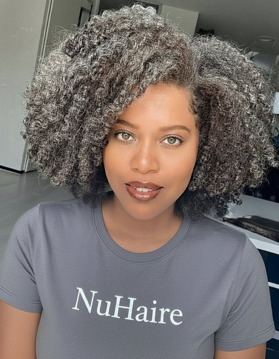 Closer view of a Model showcasing NuHaire's Salt & Pepper Kinky Curly Bob | 13x4x1 Transparent Lace Human Hair Wig, featuring a natural black and silver grey hair color, premium human hair, bouncy kinky curly texture, and a 13x4 Transparent Lace Front.
