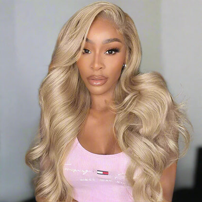 Ash Honey Blonde 13x4 Body Wave Wig on model front view showcasing honey blonde color and natural hairline