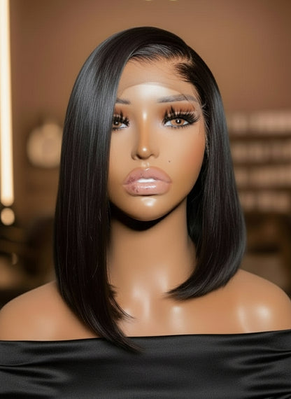 Front view of a Mannequin head displaying a NuHaire Short Straight Angled Bob Wig features a natural black color, premium human hair quality, HD transparent lace front, silky straight texture, and a natural hairline.