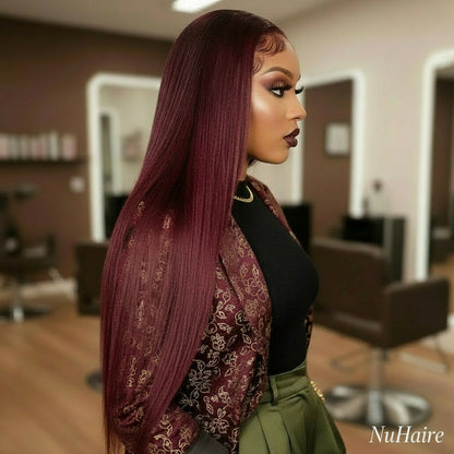 Side view of A model is showcasing a straight burgundy wig that features a 13x4 lace front.