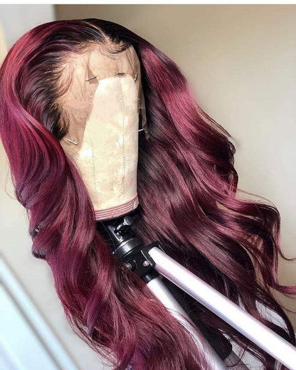 1B/99J burgundy ombre body wave wig with 13x4 lace front on mannequin head from side angle showing full length ombre color blend and transparent lace quality