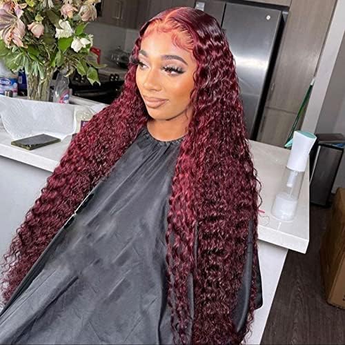 Model with freshly installed 99J dark burgundy deep curly wig in a professional salon setting showing natural 13x6 lace front application