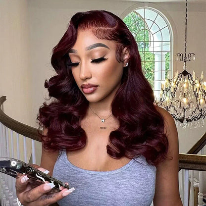 Deep Burgundy 13x6 Transparent lace front human hair natural wave wig displayed on a model showing a premium natural hairline, natural wave texture, and a realistic scalp in a home