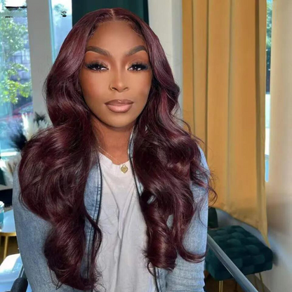 Deep Burgundy 13x6 Transparent lace front human hair natural wave wig displayed on a model showing a premium natural hairline, natural wave texture, and a realistic scalp