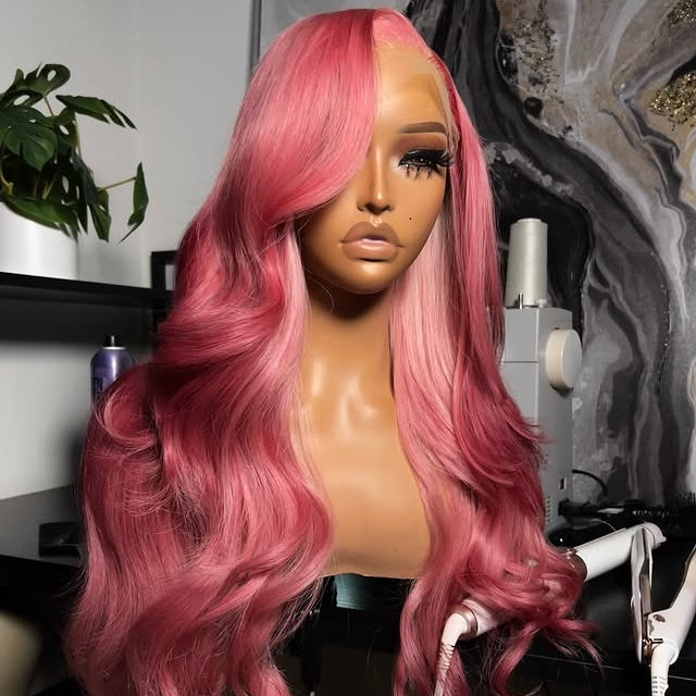 Mannequin head with NuHaire Raspberry pink balayage wig, showcasing pink body waves, premium European Human Hair Quality, 13x4 transparent lace front, and natural hairline in a room setting.