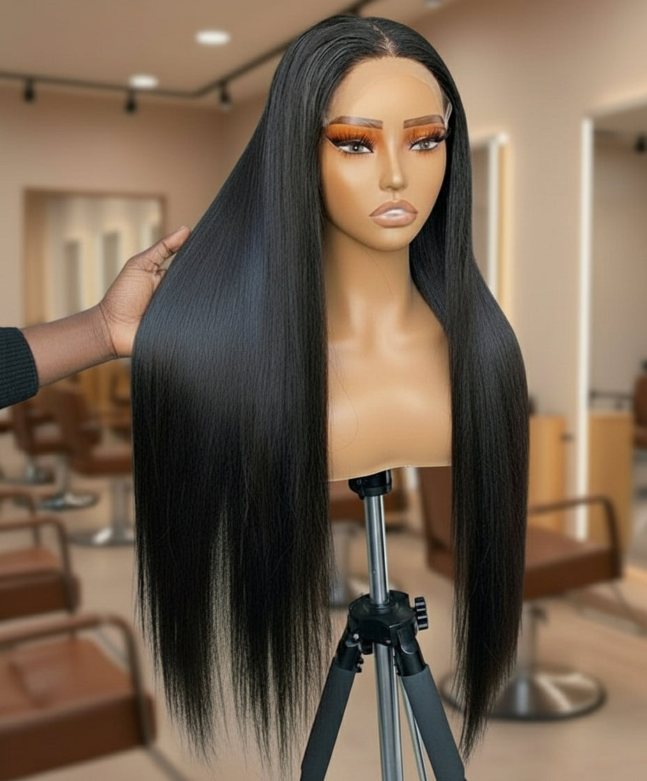 Mannequin head displaying the NuHaire 6x6 Straight Wig, which features a natural black color, premium human hair quality, and a 6x6 lace closure for a natural-looking hairline.