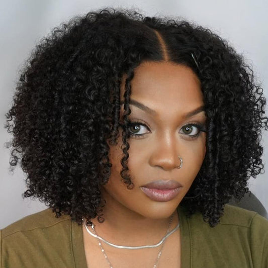 Woman wearing Nuhaire's Pixie curly wig made from unprocessed raw human hair, showcasing a curly texture, 250% density, and a skin melt HD hairline, dressed in a green top against a neutral background.