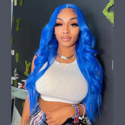 A person wearing a NuHaire sky blue human hair wig with a 13x4 transparent lace front, pre-plucked hairline, and a white top.
